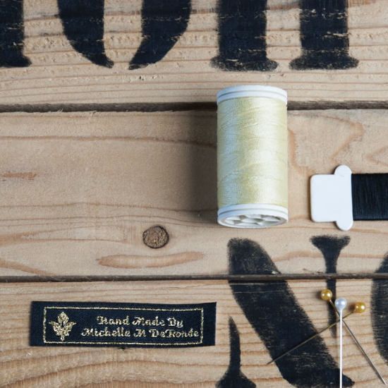 Sew on label for Michelle DeKonde