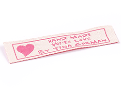 Tina Gorman pink on white clothing label