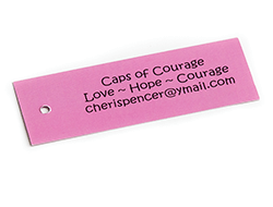 Caps of Courage hangtag with contact info